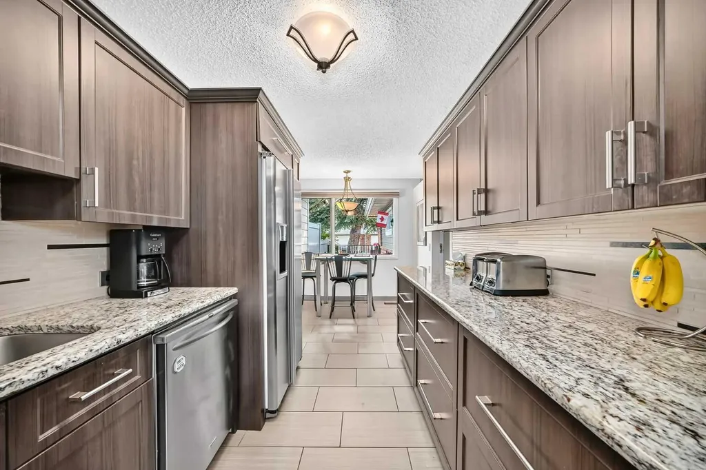 66 Woodmeadow Close SW Calgary AB T2W 4L8