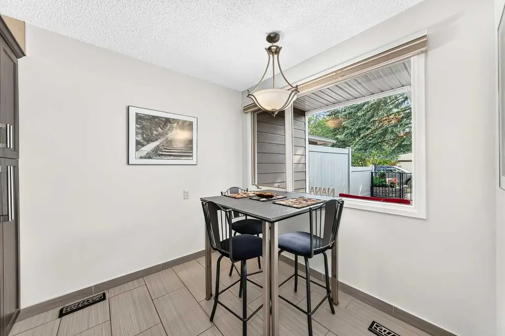 66 Woodmeadow Close SW Calgary AB T2W 4L8