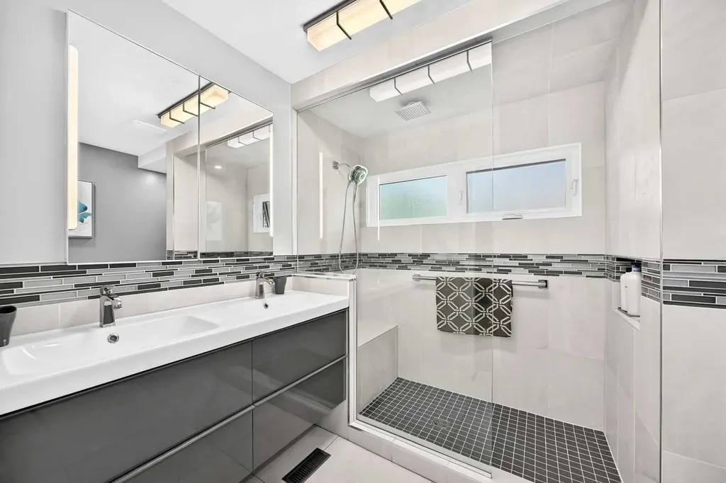 66 Woodmeadow Close SW Calgary AB T2W 4L8