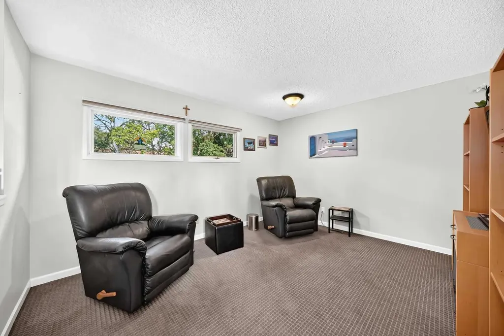 66 Woodmeadow Close SW Calgary AB T2W 4L8