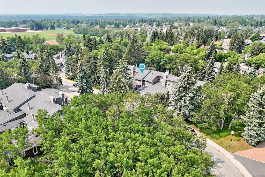 66 Woodmeadow Close SW Calgary AB T2W 4L8