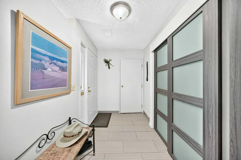 66 Woodmeadow Close SW Calgary AB T2W 4L8