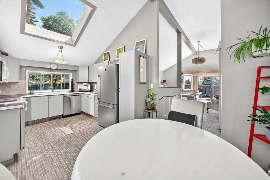 310 Huntham Place NE Calgary AB T2K 4G7
