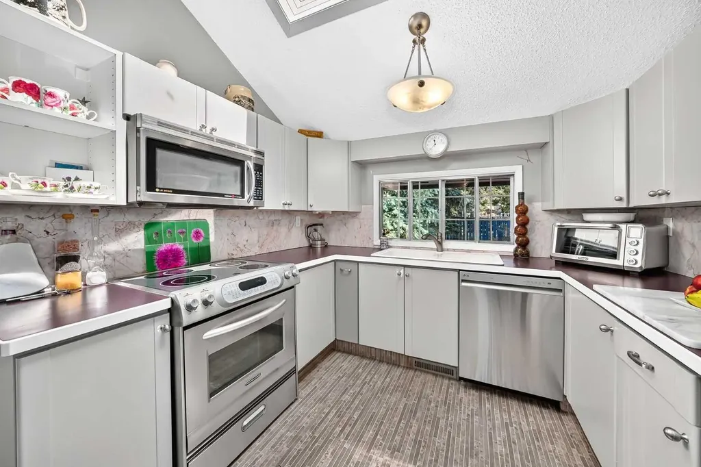 310 Huntham Place NE Calgary AB T2K 4G7