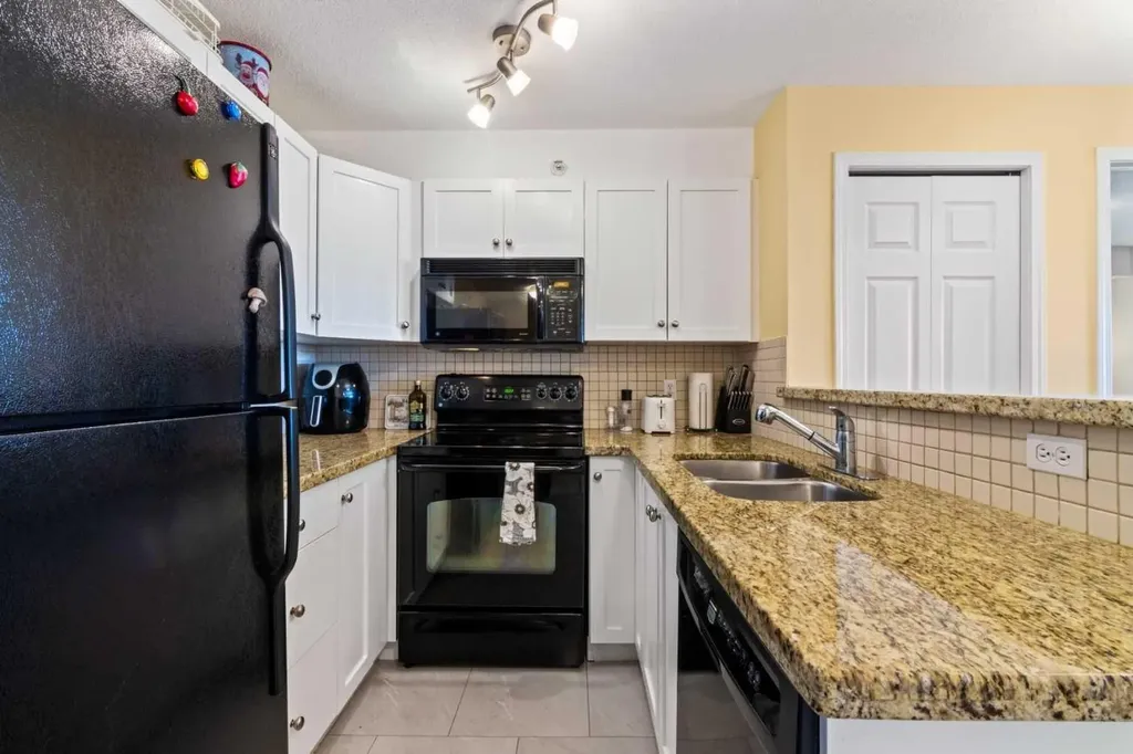 8 Bridlecrest Drive SW Calgary AB T2Y 0H7
