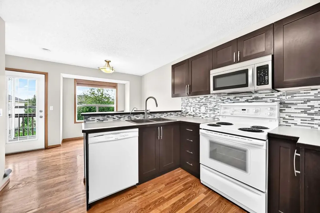 142 Quigley Close Cochrane AB T4C 1S4