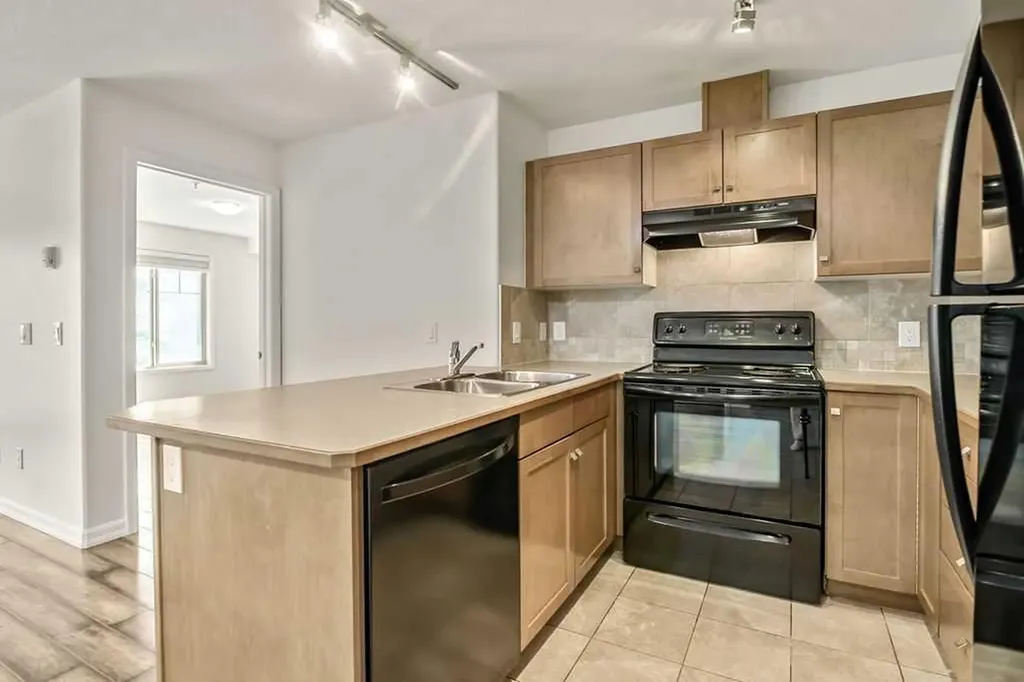 92 Crystal Shores Road Okotoks AB T1S2N1