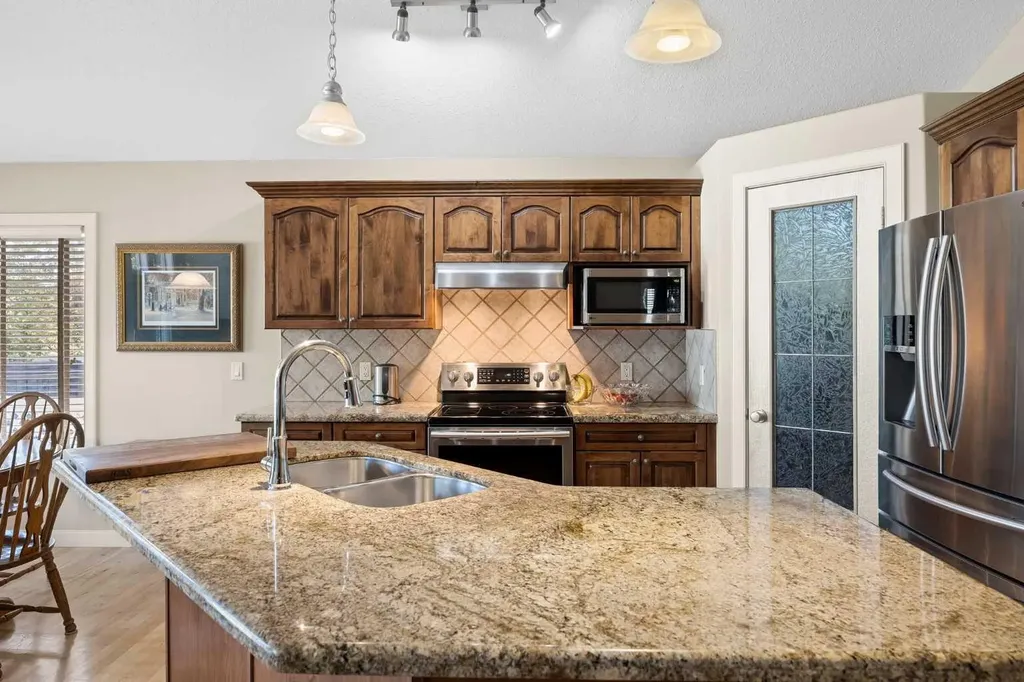 93 Coach Court SW Calgary AB T3H 4P7