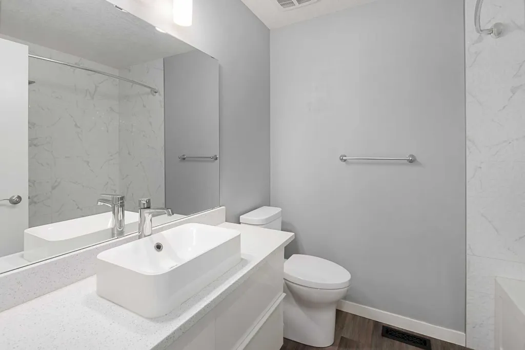 51 Woodmont Road SW Calgary AB T2W 4L6