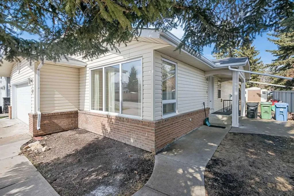 51 Woodmont Road SW Calgary AB T2W 4L6