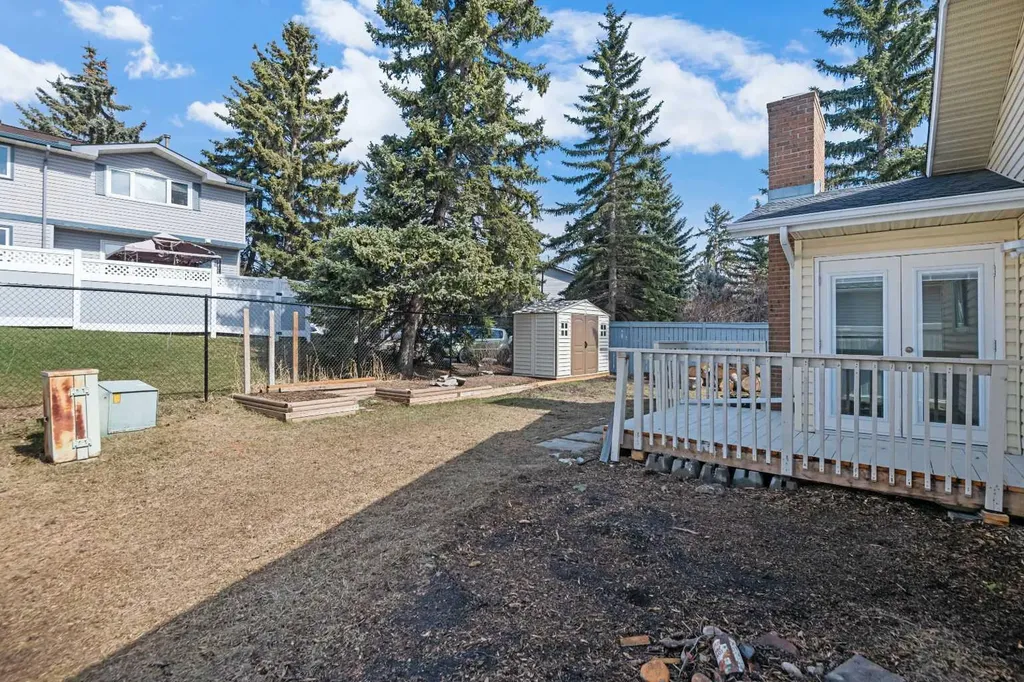 51 Woodmont Road SW Calgary AB T2W 4L6
