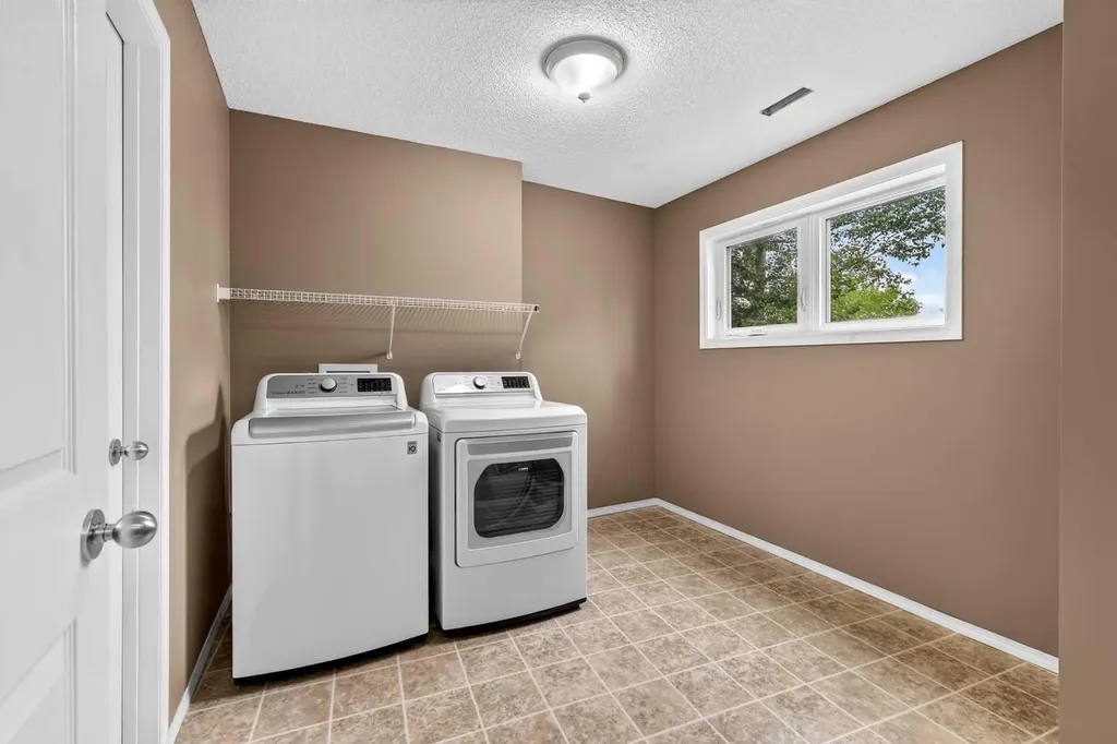 7 Westland Road Okotoks AB T1S 1Z1