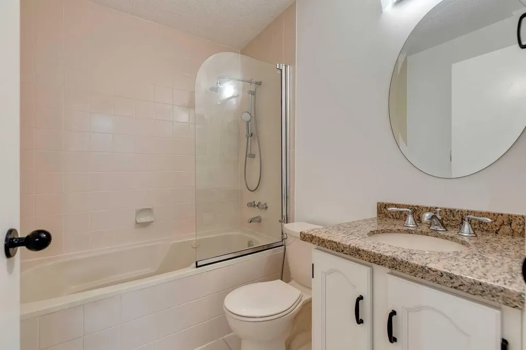 51 Straddock Crescent SW Calgary AB T3H 2S9
