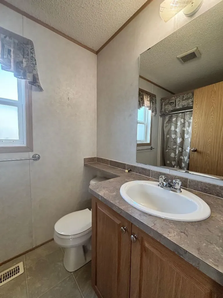 9014 89 Avenue Grande Prairie AB T8X 0C4