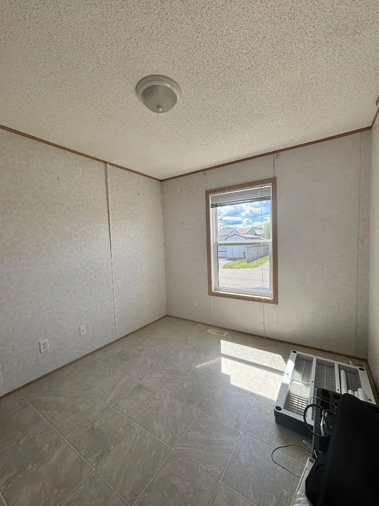 9014 89 Avenue Grande Prairie AB T8X 0C4