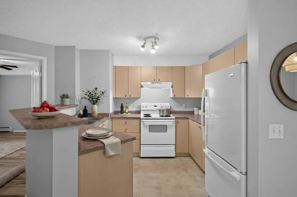 304 Mackenzie Way SW Airdrie AB T4B 3H6