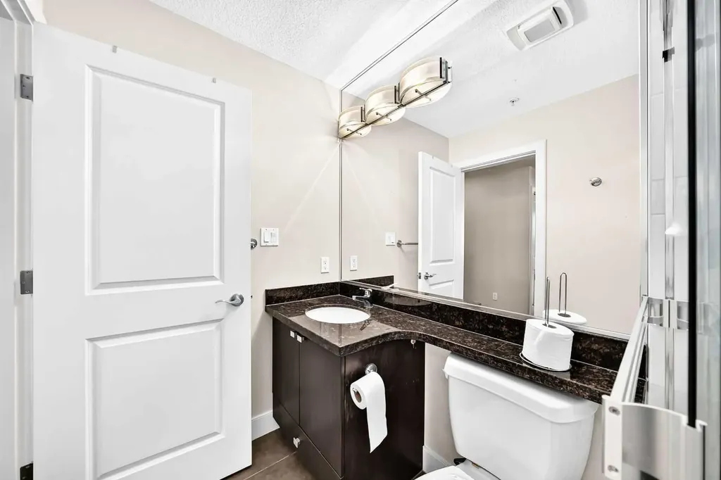 77 Spruce Place SW Calgary AB T3C 3X6