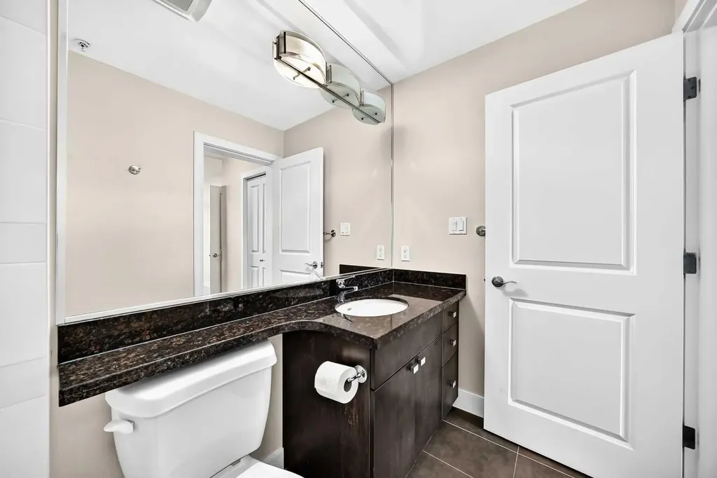 77 Spruce Place SW Calgary AB T3C 3X6