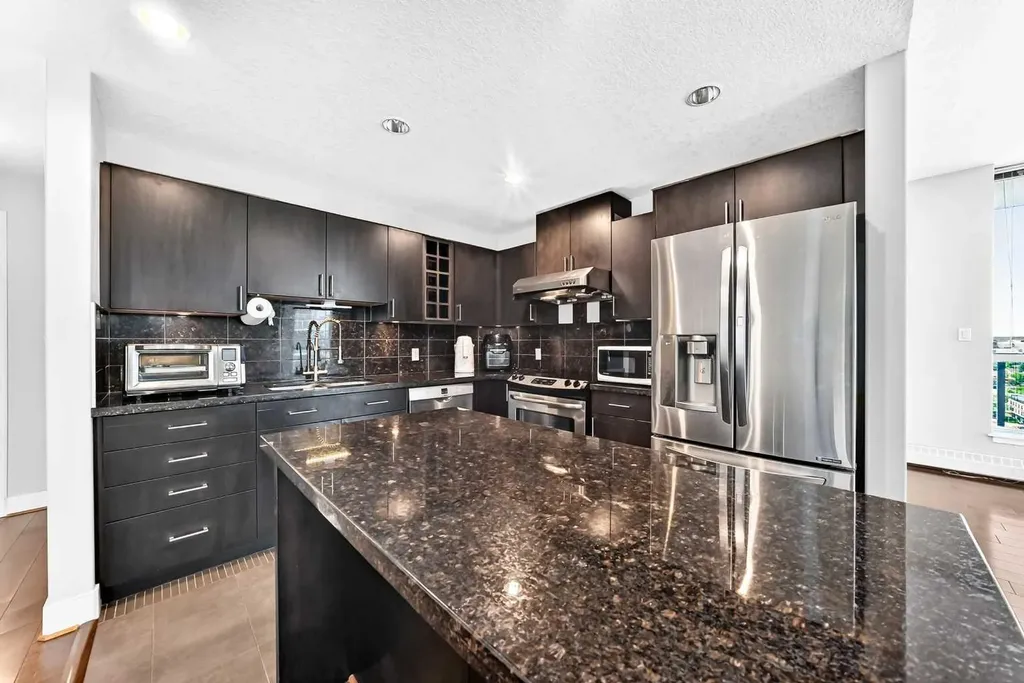 77 Spruce Place SW Calgary AB T3C 3X6