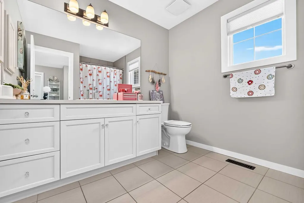 145 Kinniburgh Gardens Chestermere AB T1X 0R7