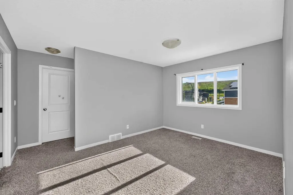 90 Wolf Creek Rise SE Calgary AB T2X 4X1