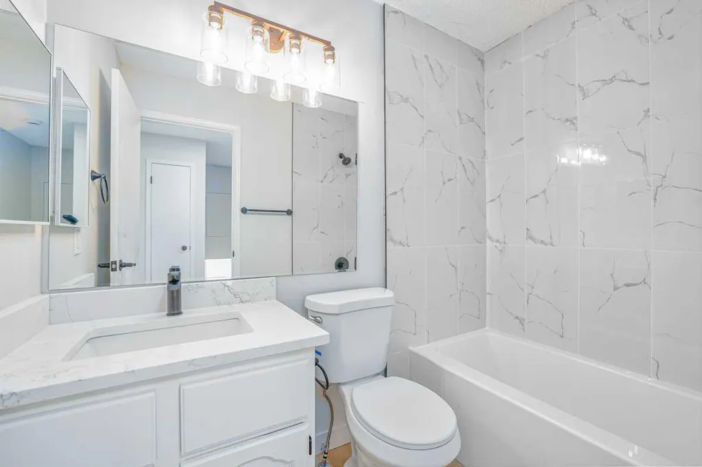 208 Macewan Valley Road NW Calgary AB T3K 3P1