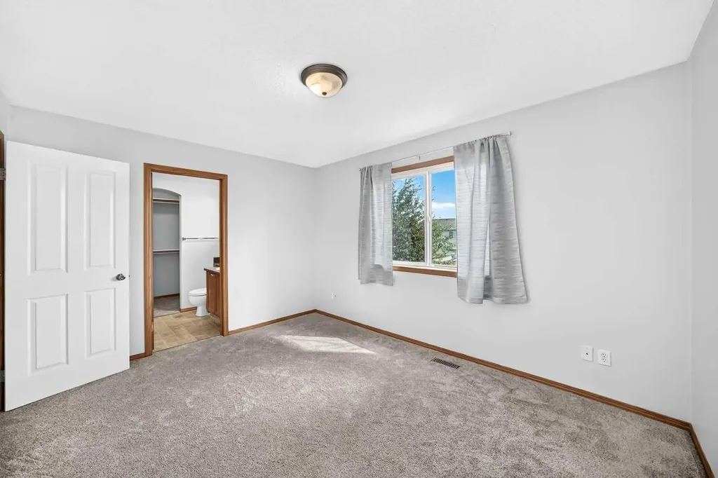 144 Covehaven Road NE Calgary AB T3K 5W7