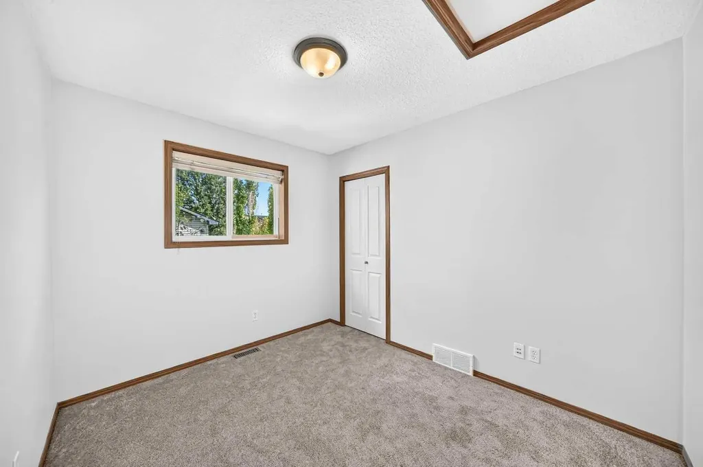 144 Covehaven Road NE Calgary AB T3K 5W7