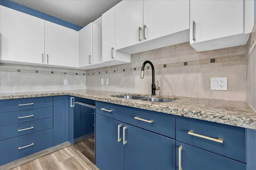 77 Spruce Place SW Calgary AB T3C 3X6