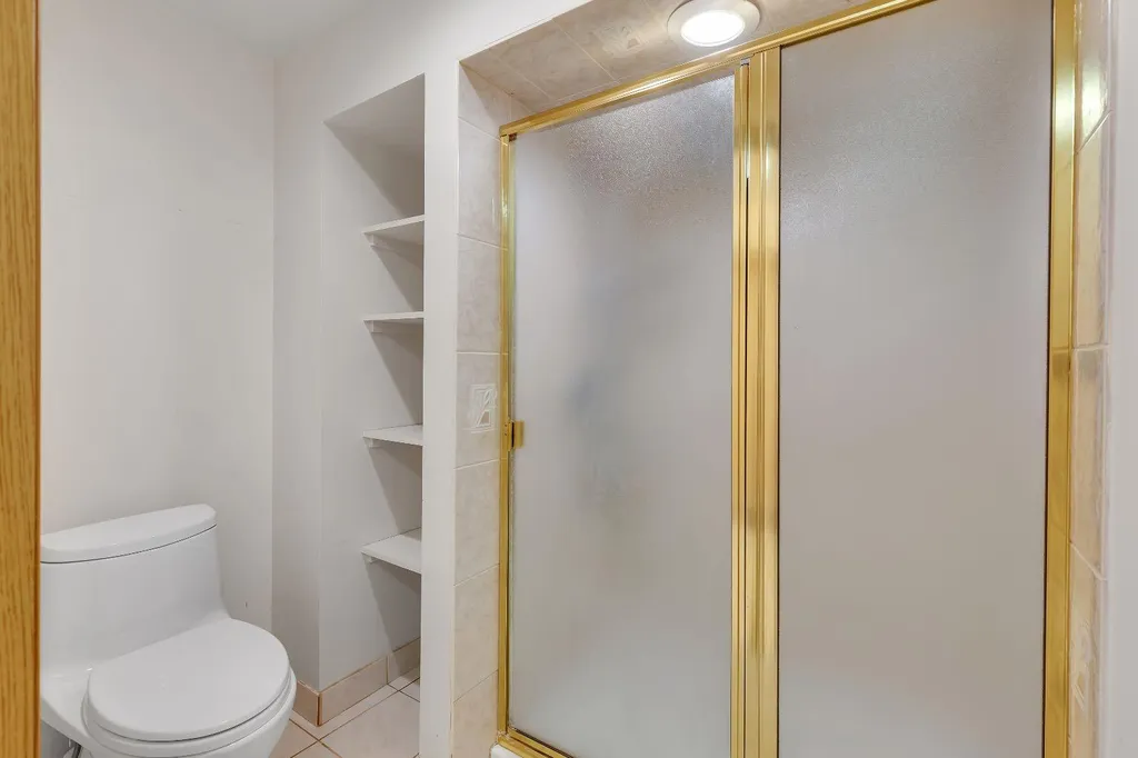24 Woodgrove Crescent SW Calgary AB T2W 3Z1