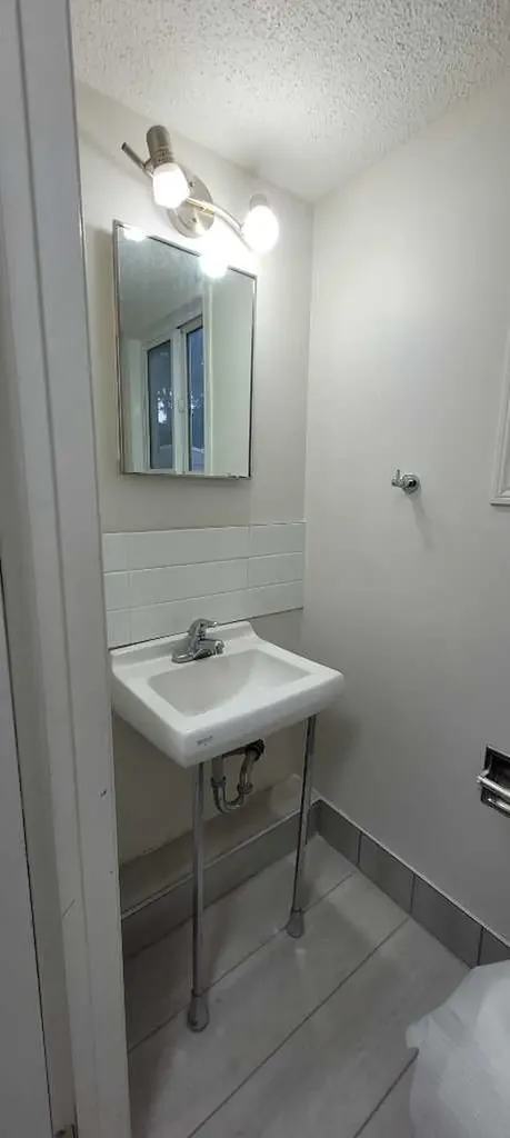 210 Woodmont Court SW Calgary AB T2W 4X1