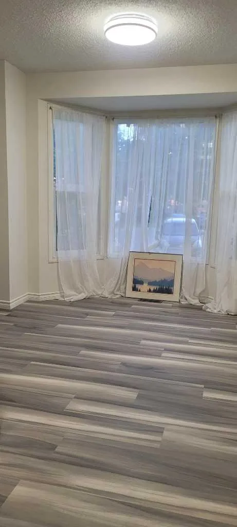 210 Woodmont Court SW Calgary AB T2W 4X1