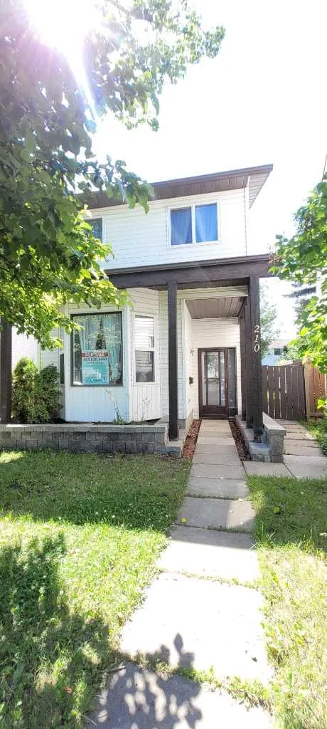 210 Woodmont Court SW Calgary AB T2W 4X1