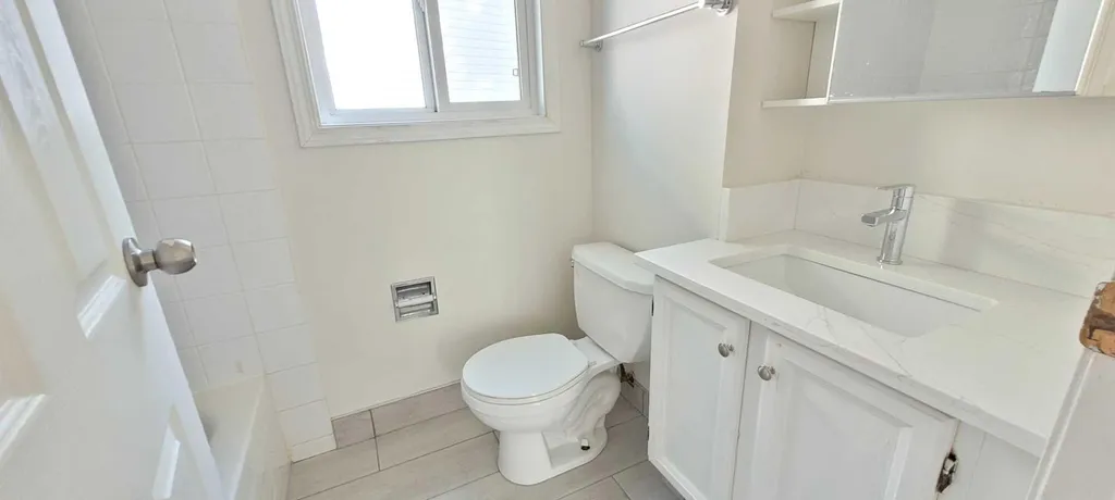 210 Woodmont Court SW Calgary AB T2W 4X1
