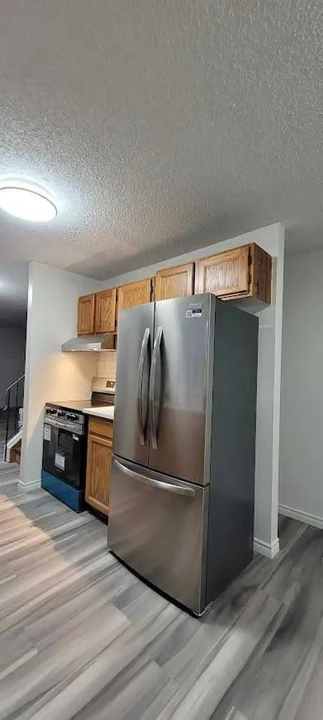 210 Woodmont Court SW Calgary AB T2W 4X1