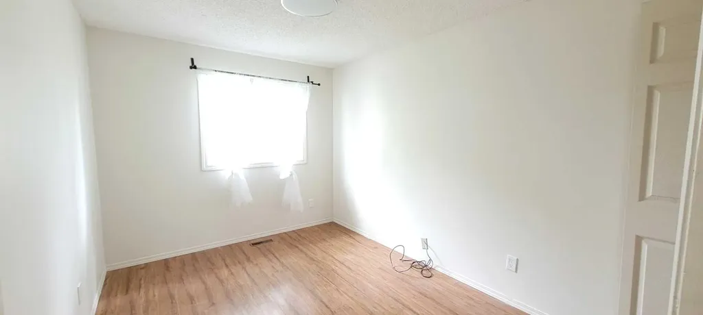210 Woodmont Court SW Calgary AB T2W 4X1