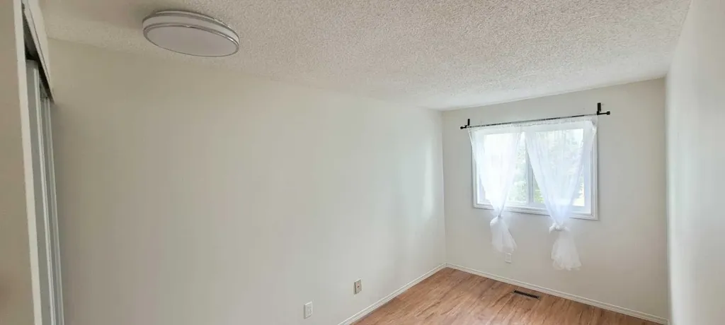 210 Woodmont Court SW Calgary AB T2W 4X1