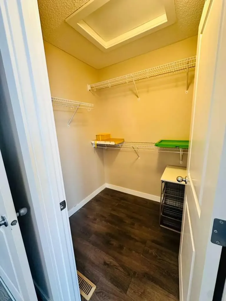 225 Panatella Square NW Calgary AB T3K 0V5