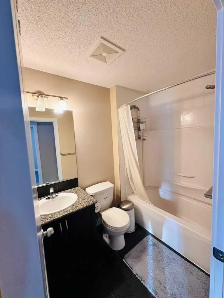 225 Panatella Square NW Calgary AB T3K 0V5