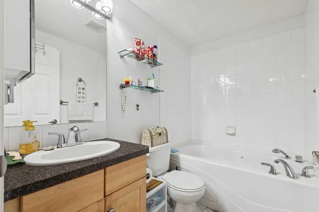 2022 Canyon Meadows Drive SE Calgary AB T2J 7H1