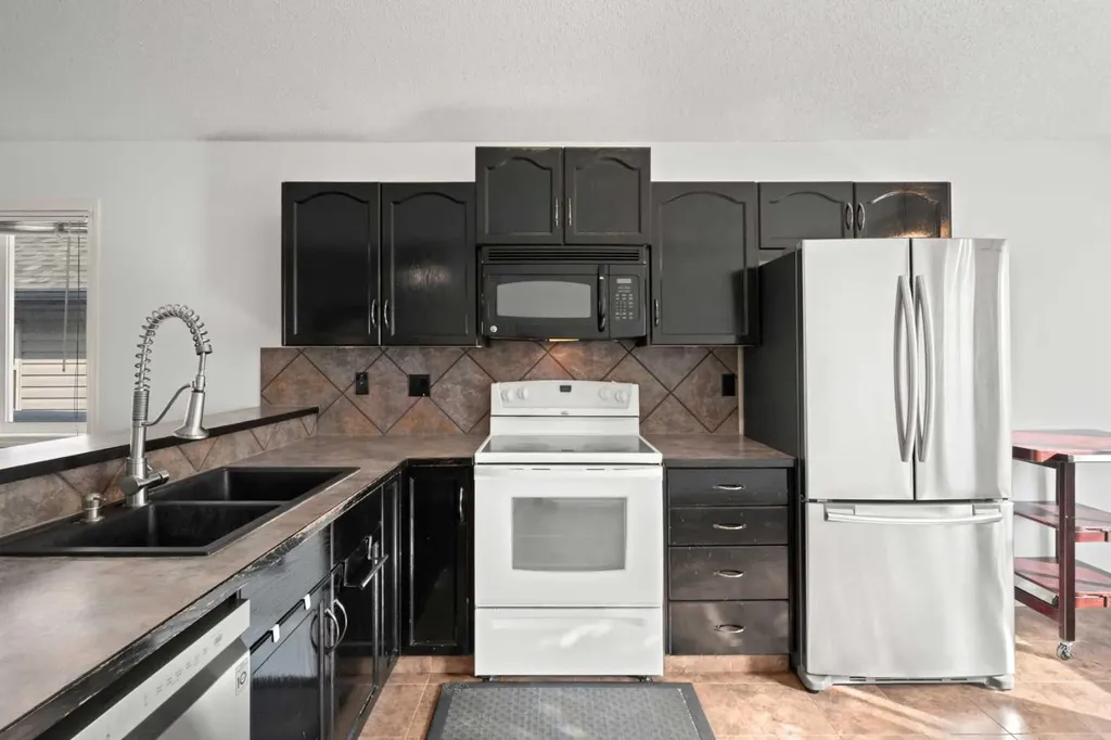 145 Cimarron Grove Circle Okotoks AB T1S 2M1