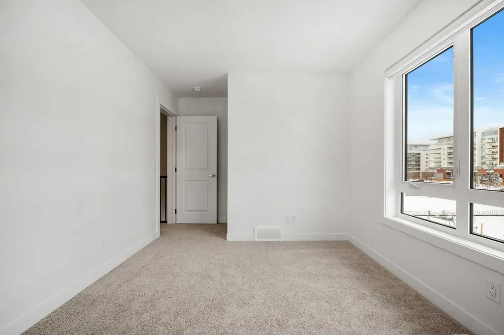 8323 8 Avenue SW Calgary AB T3H 6M8
