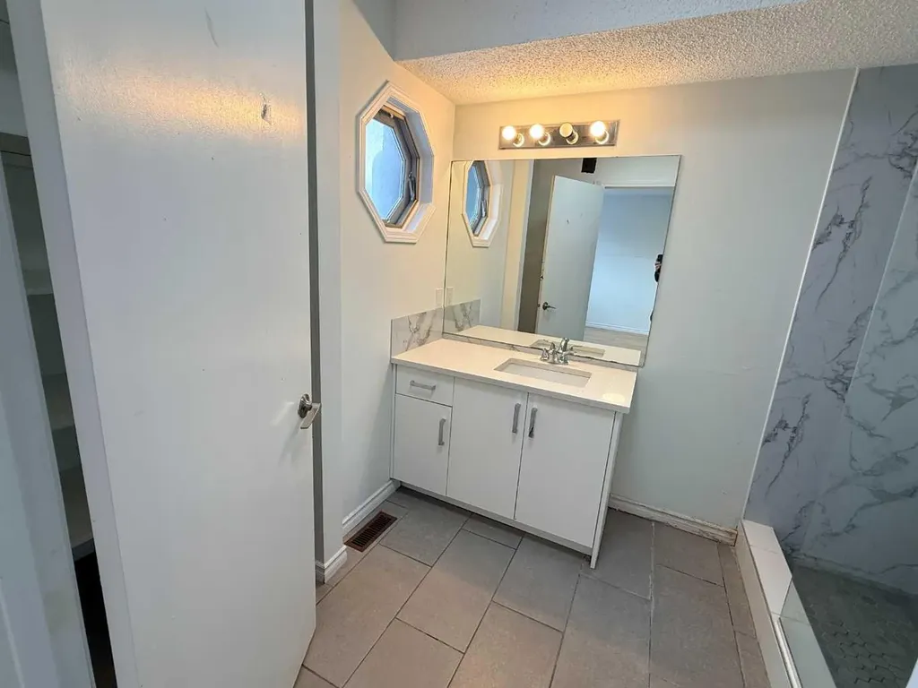 651 Macewan Drive NW Calgary AB T3K 3R1