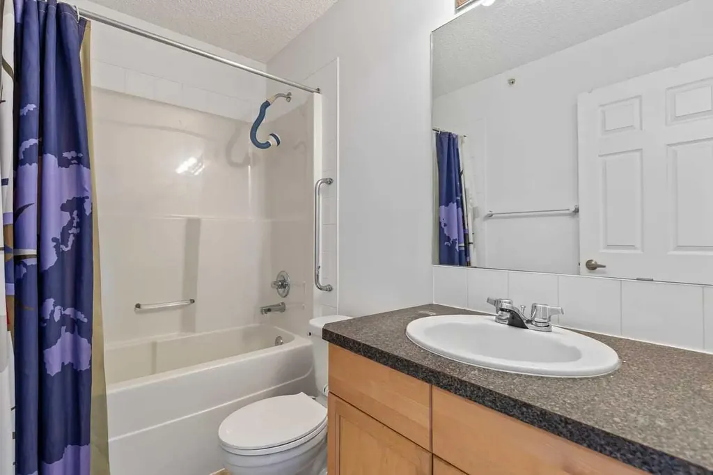 2022 Canyon Meadows Drive SE Calgary AB T2J 7H1