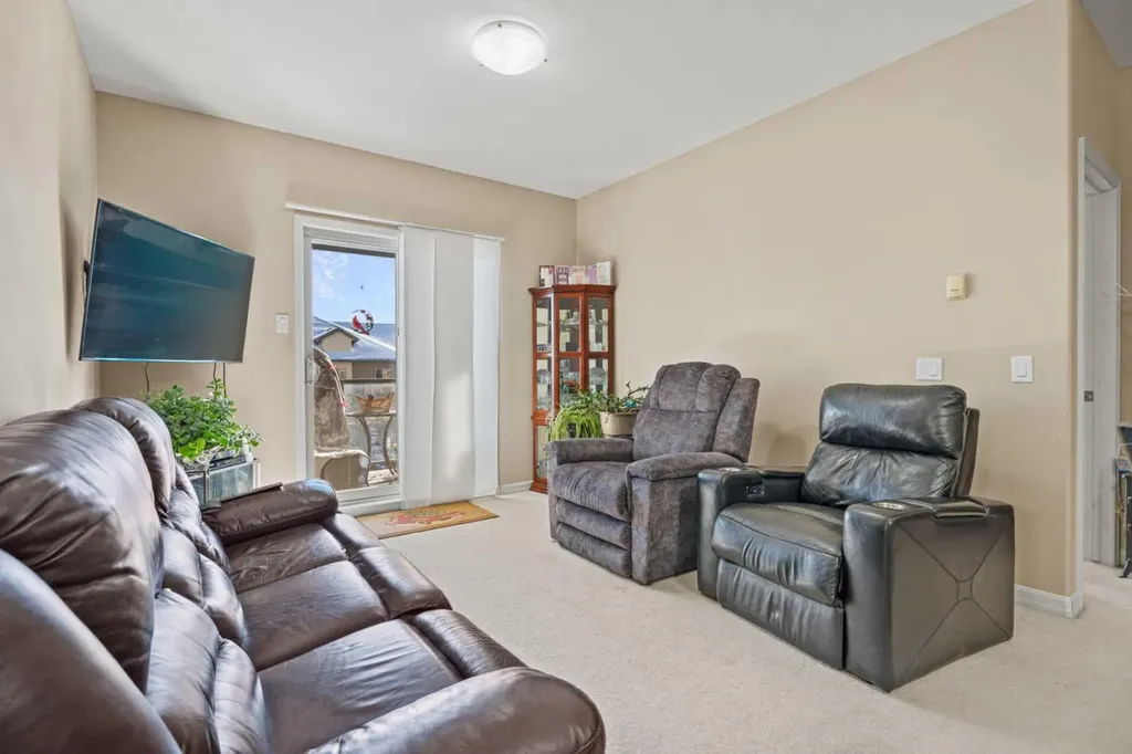 92 Crystal Shores Road Okotoks AB T1S 2N1