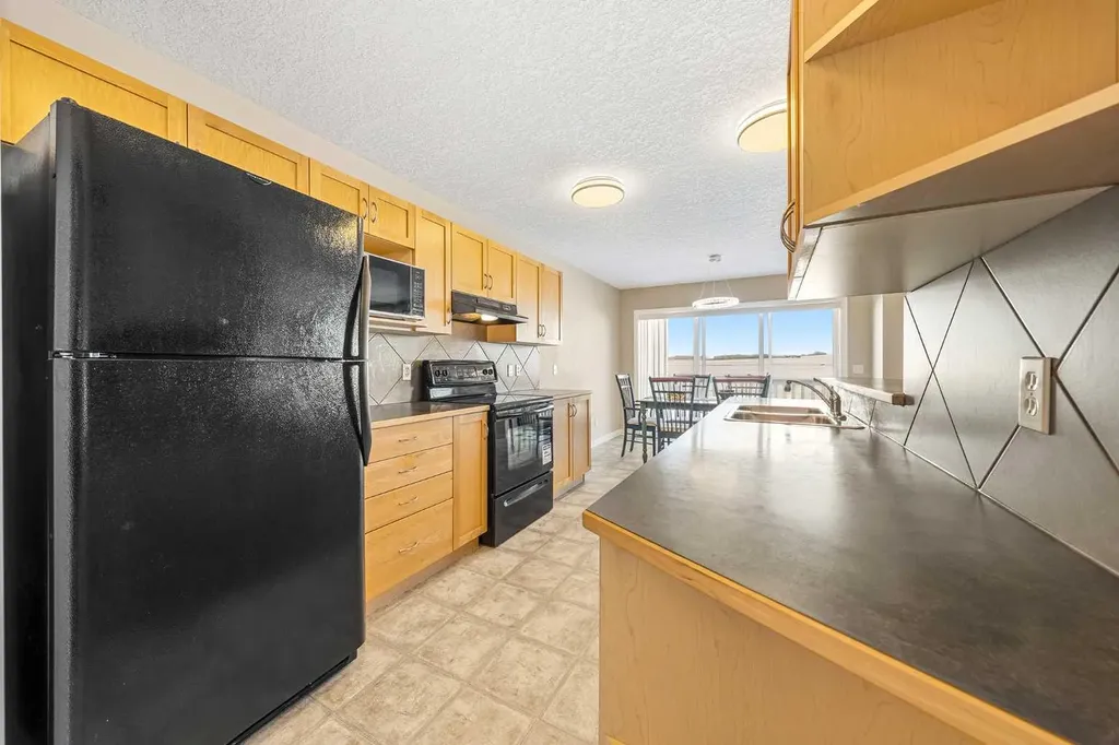 91 Bridlecrest Street SW Calgary AB T2Y 4Y8