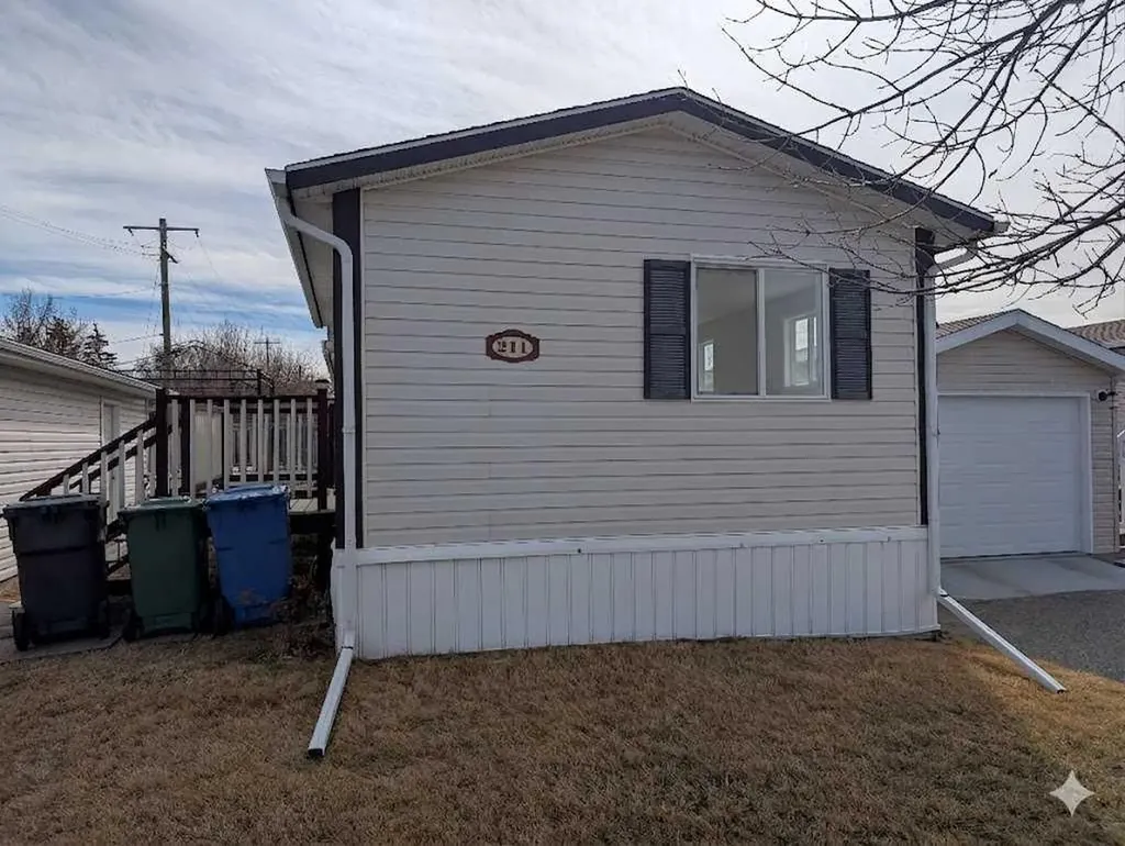 211 Railway Avenue Coaldale AB T1M 0A8