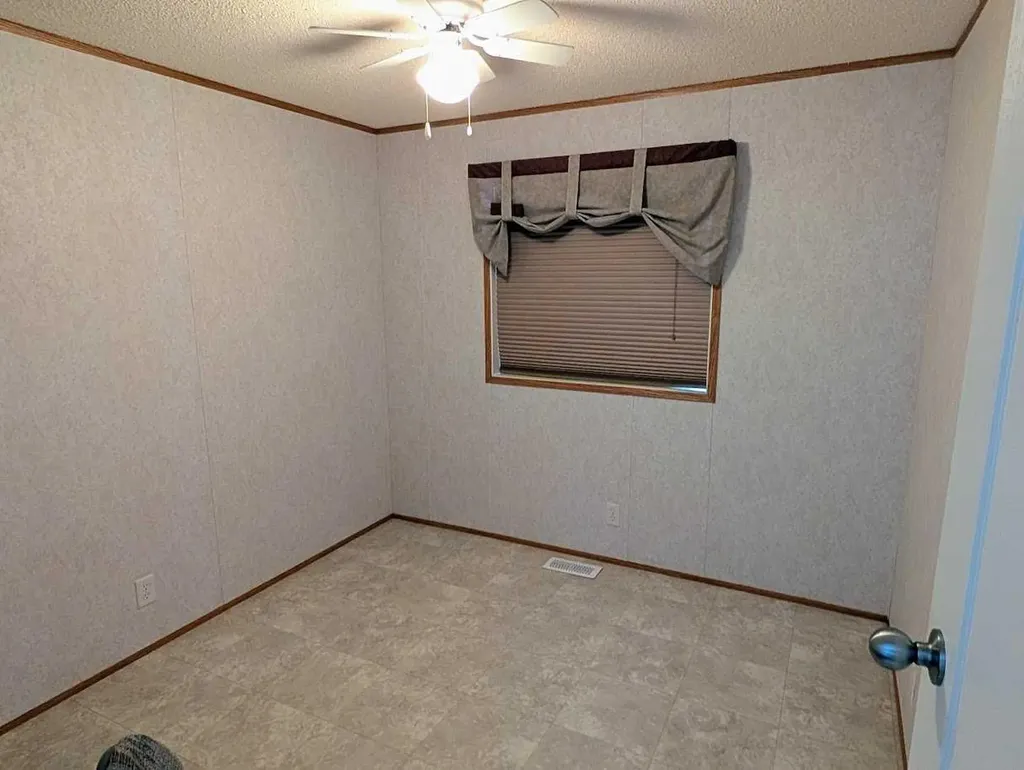 211 Railway Avenue Coaldale AB T1M 0A8