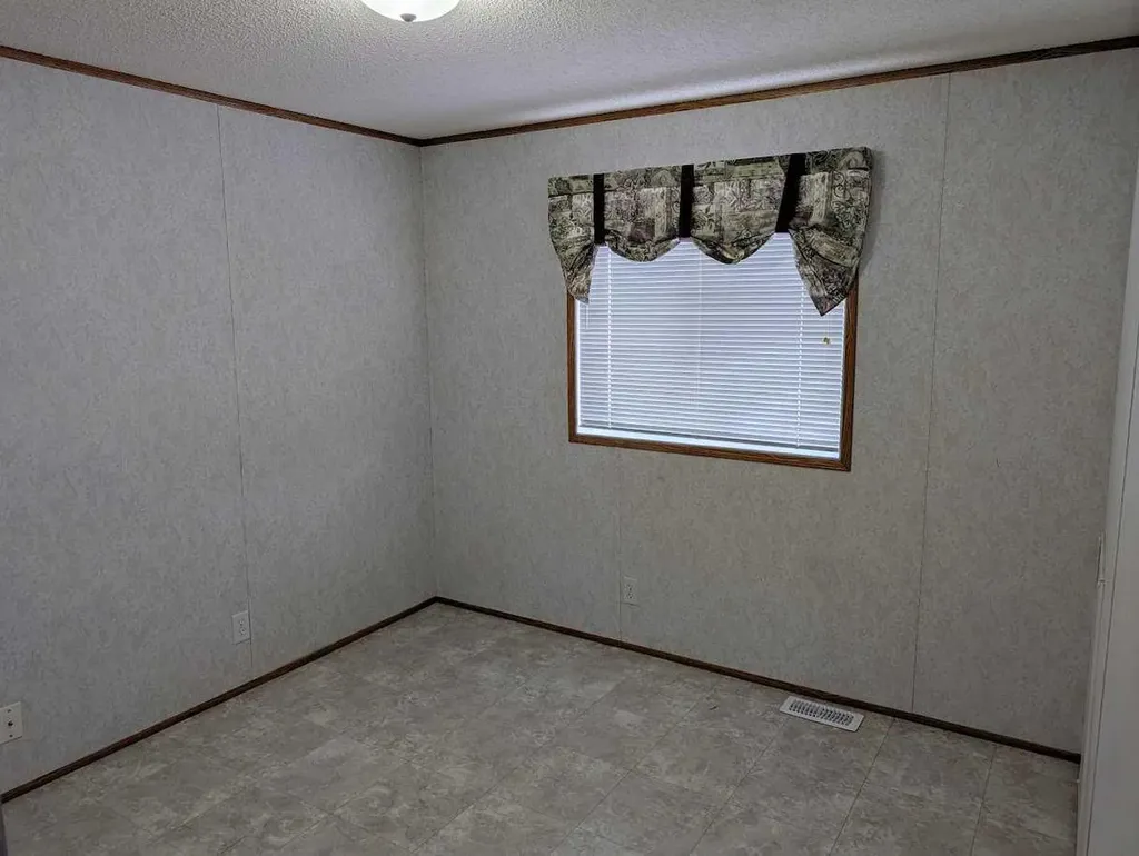 211 Railway Avenue Coaldale AB T1M 0A8