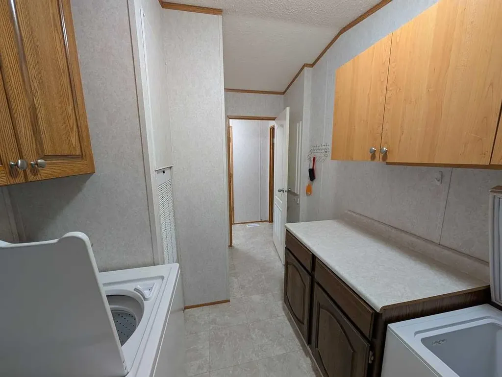 211 Railway Avenue Coaldale AB T1M 0A8